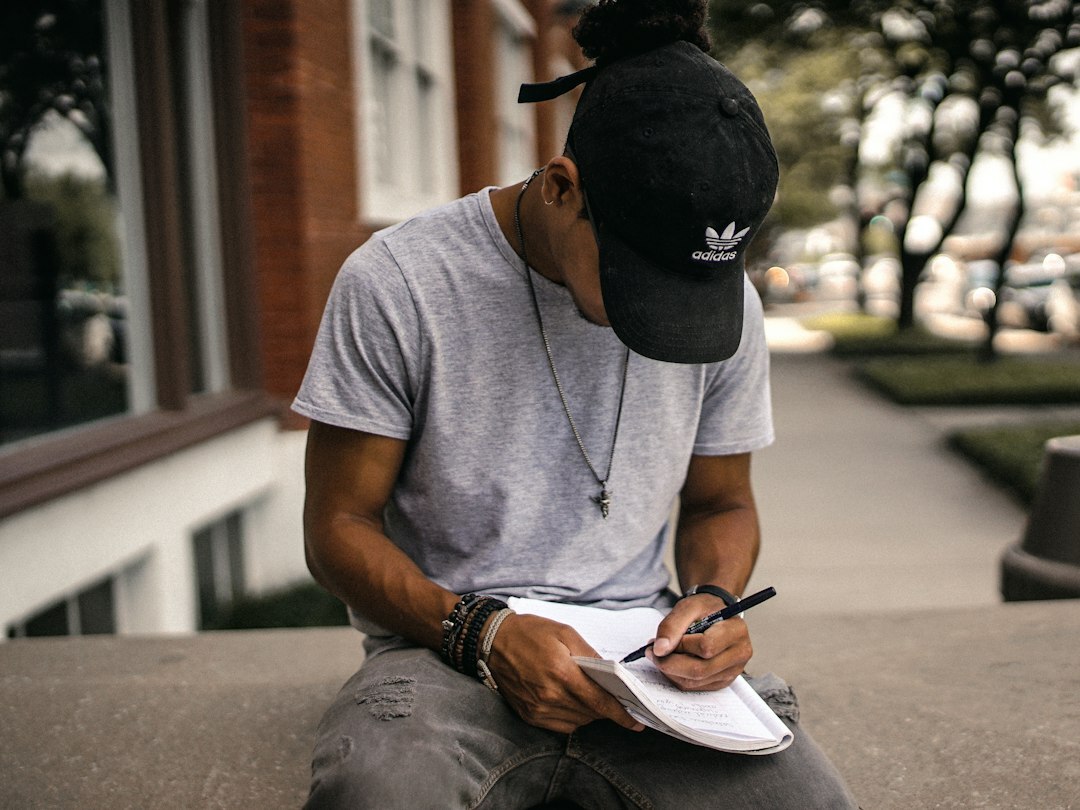 person writing goals